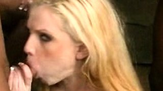 Blonde milf housewife having group sex in a kitchen