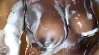 Sexy African Girl with Big Natural Tits Fucking a Bottle in the Shower..