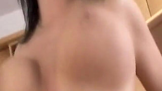 Raven haired hottie Marille strips and squeezes her massive natural tits before revealing her pussy