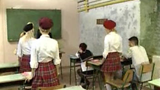 Pissing schoolgirls in the classroom