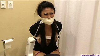 Nicole Oring is a tightly tied and gagged babysitter