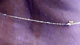 Young girl stripping and taking bath