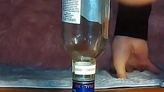 Sister Jumping on a Giant Bottle