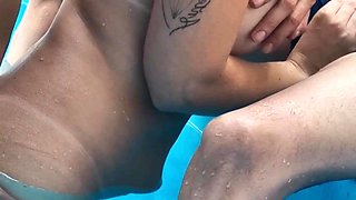 AT THE CLUB POOL
