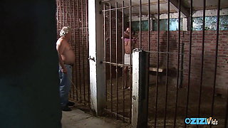 Caged sex slave sucks an old fat guy's cock dry