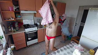 Amateur couple having fun in the kitchen.