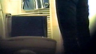 Girl using the toilet and filmed by voyeur 2