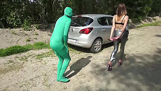 Suited slave gets punished outdoor from femdom chick