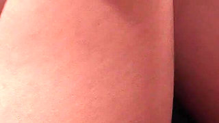 Dark haired teen makes herself squirt