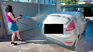 Sexy Girl Next Door in Jeans Skirt and High Heels Washes Her Car