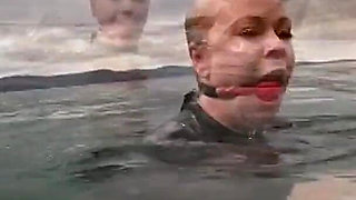 Ocean Rope Bondage with Ballgag in Wetsuit