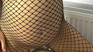Pregnant in fishnets suit with big boobs Humping couch to orgasm