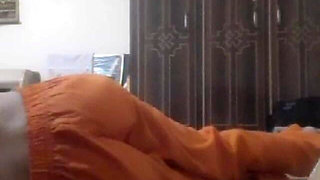 Pakistani Pathan Girl in Orange Shalwar Showing Her Ass