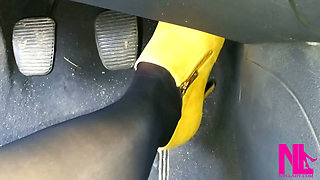 Revving in Yellow Boots and Black Pantyhose