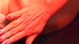 Mature Redhead Squirts Wildly in Intense Group Domination Session