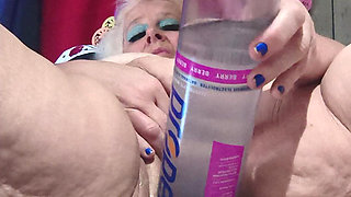 Big Bottle Plugged Clit Cunt