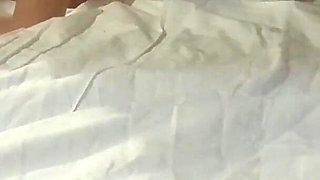 Tied up on a bed wearing pantyhose and high heels, roughly throated and hard fucked