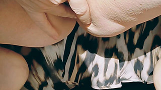 Horny mature squats, spreads and fingers her gaping cunt