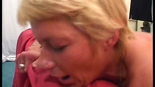 Mature blonde gets her pierced pussy licked and fucked in gangbang