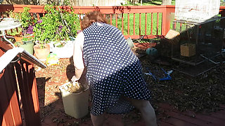 Playing in my garden showing off my tits belly ass, legs and fat pussy flashing you while cleaning up my leaves! red lace thong!