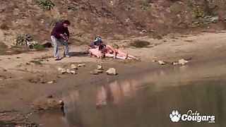Mature beauty shares passionate beach pleasure with sensual swingers heat