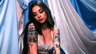 Taylor reveals her tattoo covered body