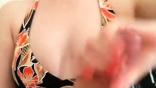 Handjob by a Busty Amateur in a Bikini