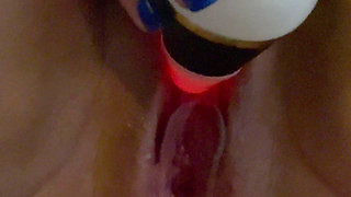 MILF squirts in a big stream because the plug in her ass is pressing