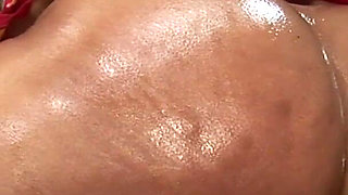 Oiled ebony babe gets fucked in her wet cunt