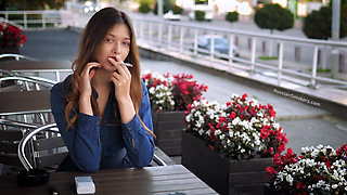 Magnetic Russian Beauty Playing with Cigarette Smoke