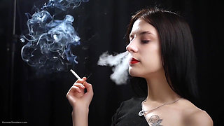 Slim Chick Is Smoking Two Reds
