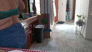 Mom in the kitchen in bralett
