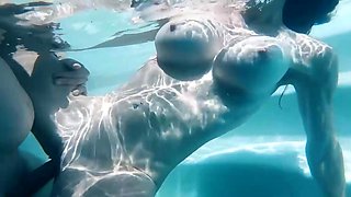 Underwater fuck with a big boobs brunette babe