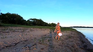 Russian Nudist on the River Shore