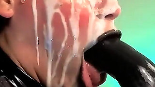 A Demon Dressed in Latex, Latex Gloves, a Latex Suit, and Black Lips, Sensually Sucks Your Cock and Spits Saliva and Semen on Me