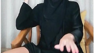 Teen in hijab smokes while teasing herself