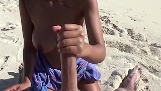 Seaside Sensation: Tanned Asian Cutie's Beachside Tease