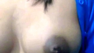 Squeezing Milk Out of Her Dark Nipples on Webcam