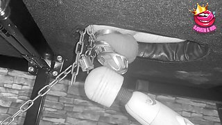 Female domination brings slave to climax in chastity cage on the stroking table