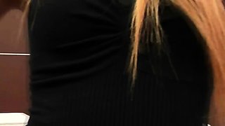 Slim ladyboy with high heels takes off her black panties