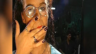Bukkake Slut with Glasses Gets Her Face Drenched in Cum