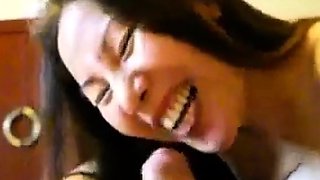 Chinese Amateur MILF Gives a Handjob