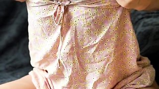 Sexy schoolgirl with pigtails shows her boobs and touches