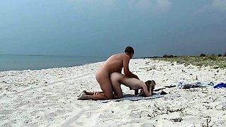 Amateur Nudist MILF Has Doggy-Style Fun at the Beach