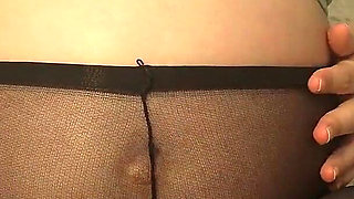 Stepmom Is Very Horny so She Talks Dirty to Her Stepson and Then Starts Playing with Her Stockings by Masturbating with the