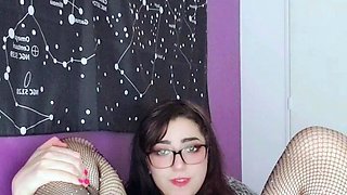 Busty babe playing with her big boobs