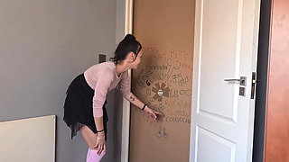 Skinny Girl Sucking Dick Through a Gloryhole and Stripping Her Clothes