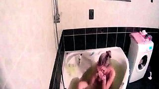 Peeking at stepdaughter Amy shaving in the bath