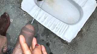 Desi Bhabhi Holding Stepbrother-in-law's Penis and Making Him Pee and Peeing Herself