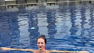 Wet Bikini Tease in the Pool